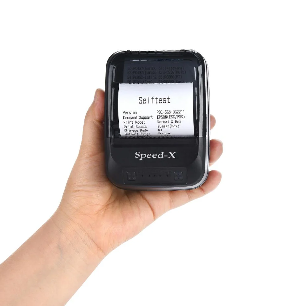 Speed-X BT450M top cover open displaying 58mm thermal paper roll installation