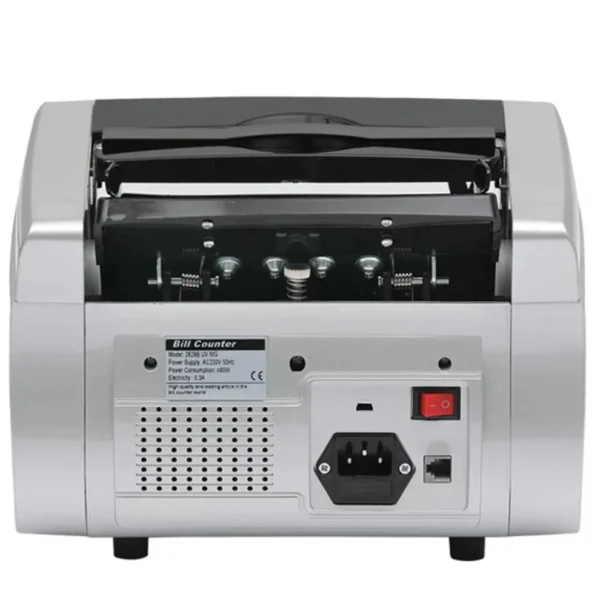 NewWave cash counter machine processing currency notes on a retail cashier desk