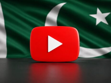 Smartphone user watching saved offline video clips stored on local storage