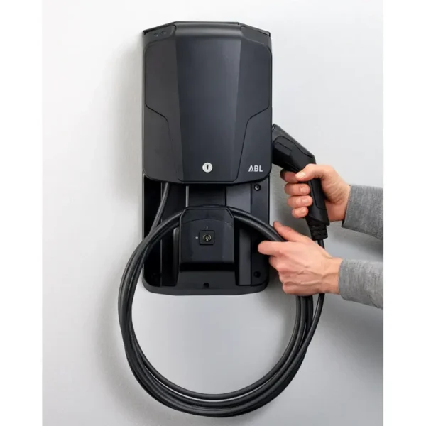 ABL Wallbox eMH1 mounted on home garage wall connected to electric vehicle