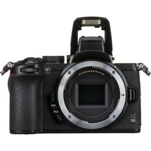 The 180 degree flip-down touchscreen extended downwards on the Nikon Z50 for vlogging setup.