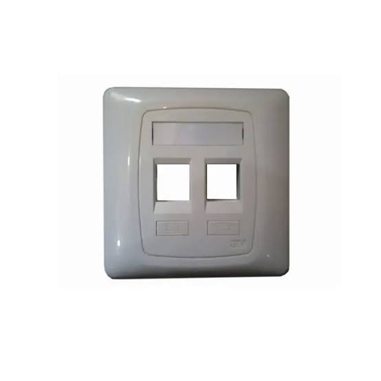 Corning 3M dual port face plate installed on an office wall with ethernet cables connected