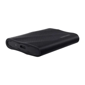 Samsung T9 2TB Portable SSD connected to a video editing workstation laptop